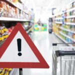 Supermercato carrello simbolo attenzione